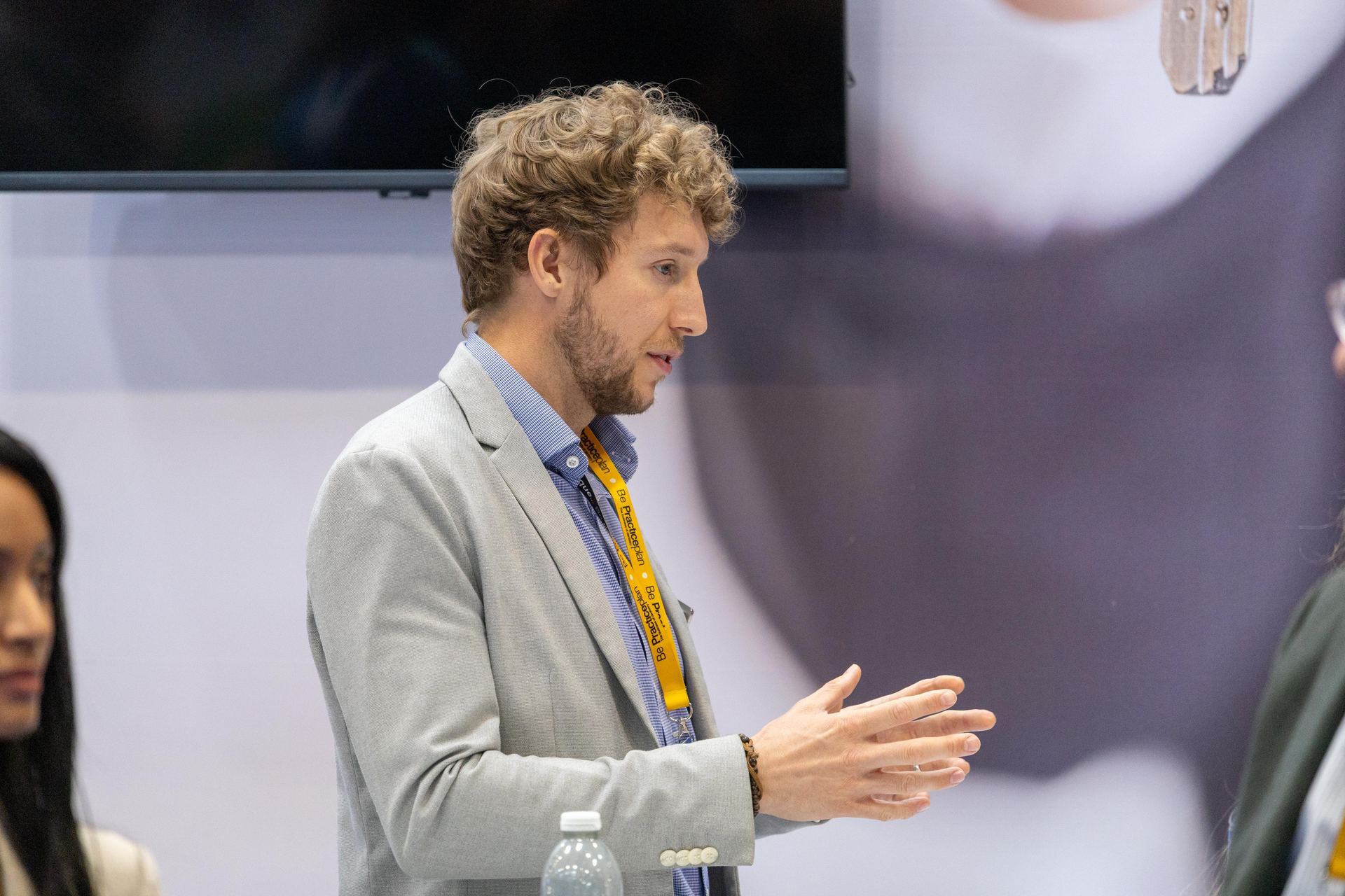 Speaker presenting to an audience